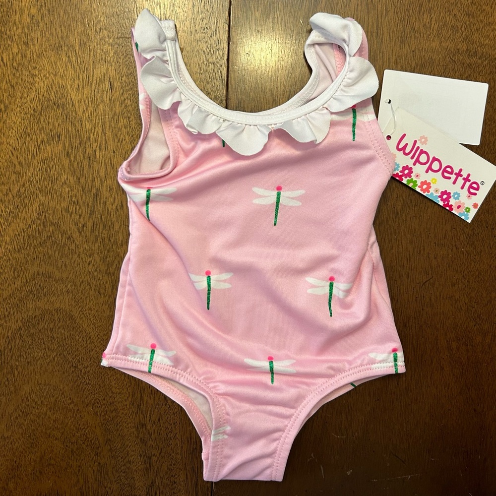 NWT Wippette bathing suit in pink with white scallops at neckline. UPF 50